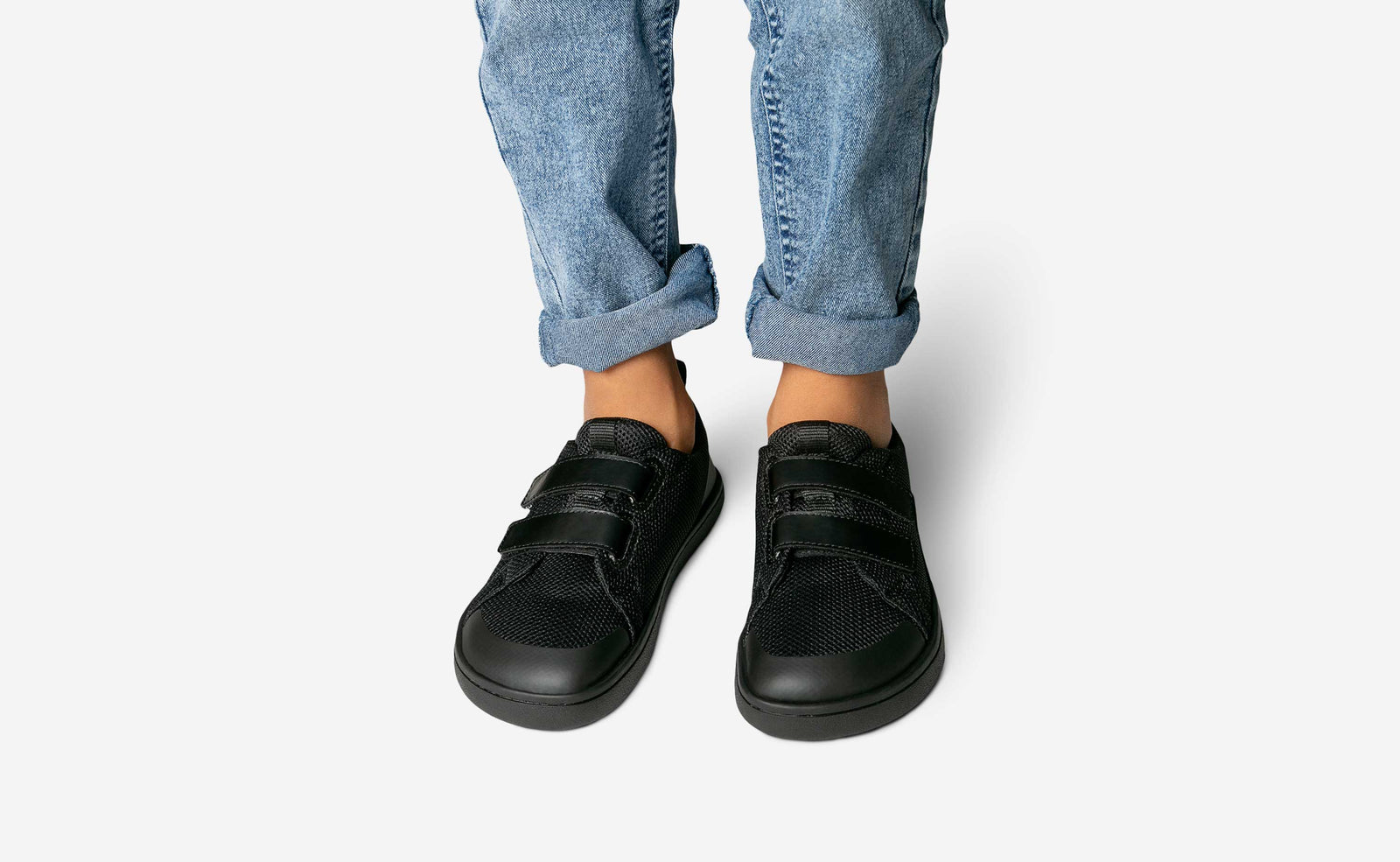 All black youth tennis shoes hot sale